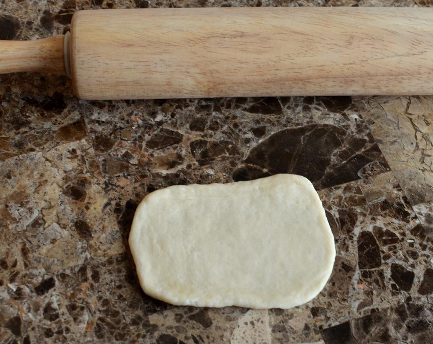 step 8 Roll out each piece with a rolling pin.