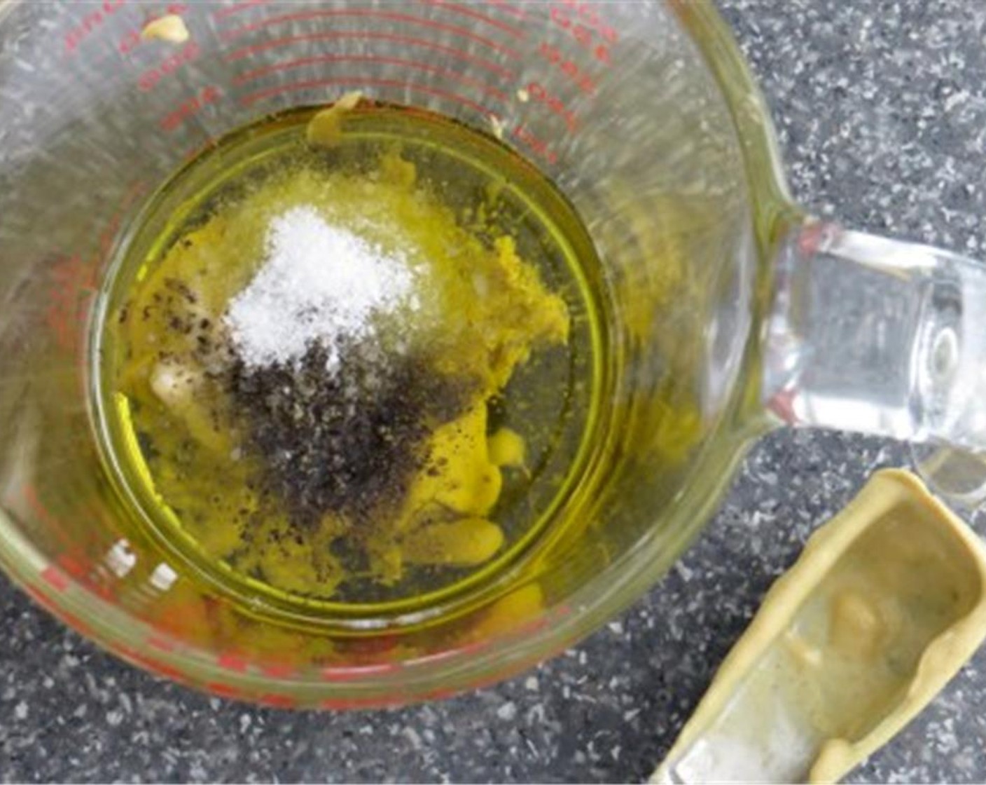 step 5 To make the dressing, combine lemon zest and juice, Olive Oil (1/2 cup), Dijon Mustard (2 Tbsp), 2 tablespoons of juice from pepperoncini pepper jar, Kosher Salt (1 tsp), and Ground Black Pepper (1 tsp) in a small bowl. Whisk.