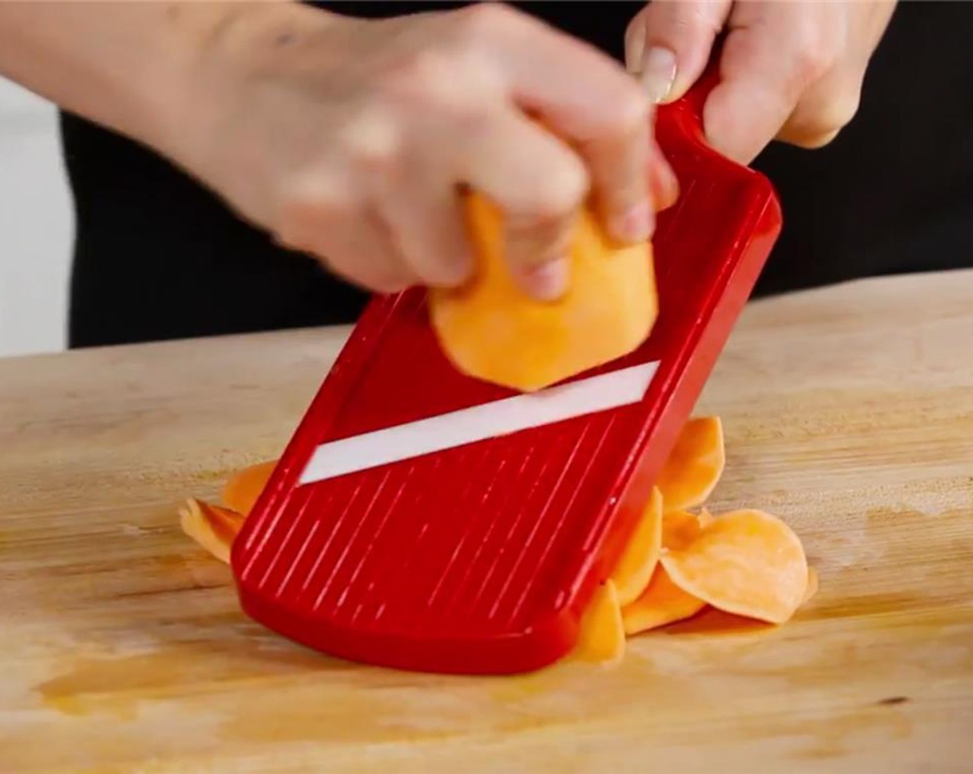 step 2 Peel and thinly slice the Sweet Potatoes (3) into rounds using a mandolin or knife.