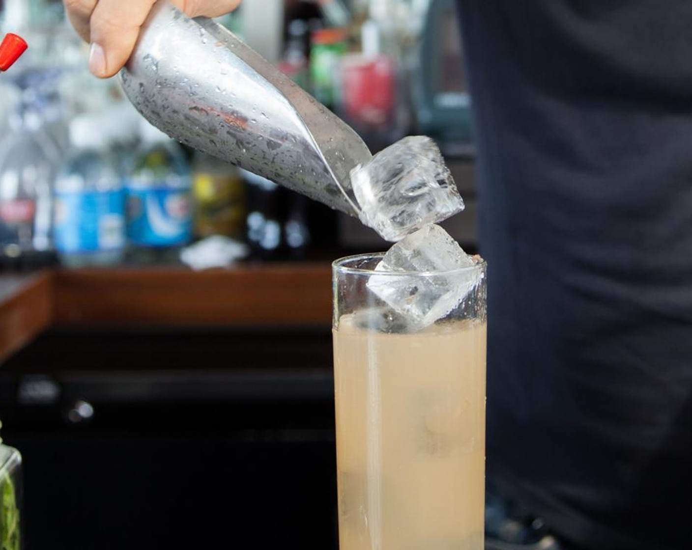 step 1 In a tall glass loaded with ice, pour in Tequila (2 fl oz), Agave Syrup (0.5 oz), juice from Lime (1/2) and Grapefruit Juice (2 fl oz).