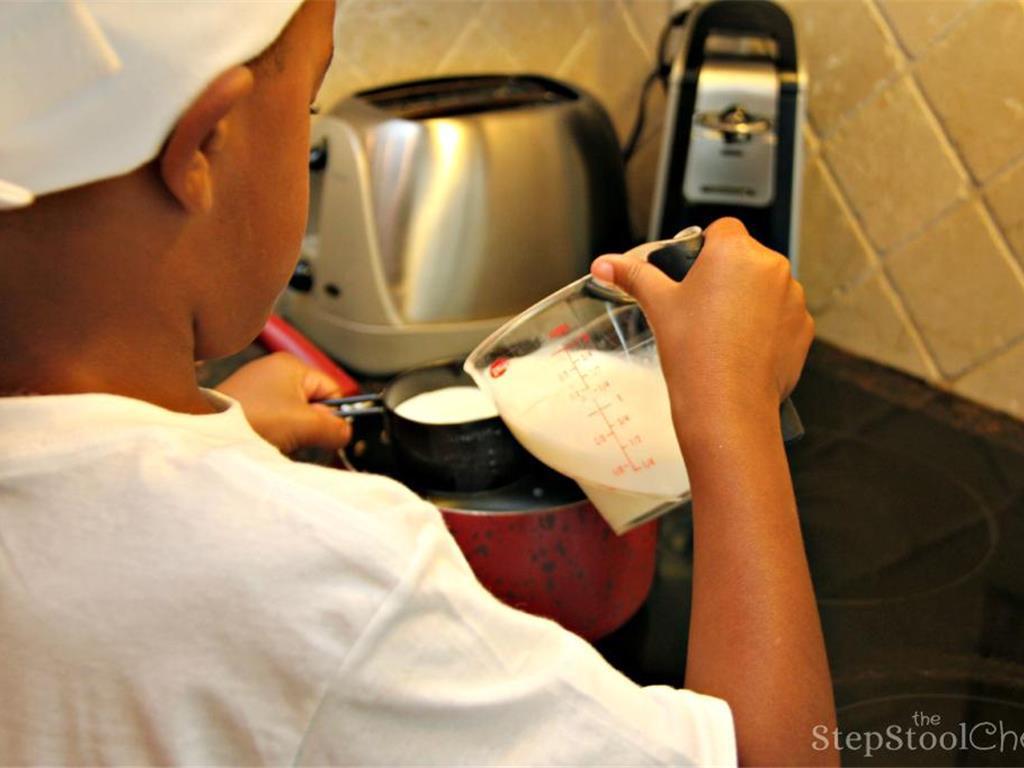 Step 4 of Simple Vanilla Soufflé Recipe: Bring one cup of the Milk (1 cup) to just steaming in a medium saucepan set over low-medium heat.