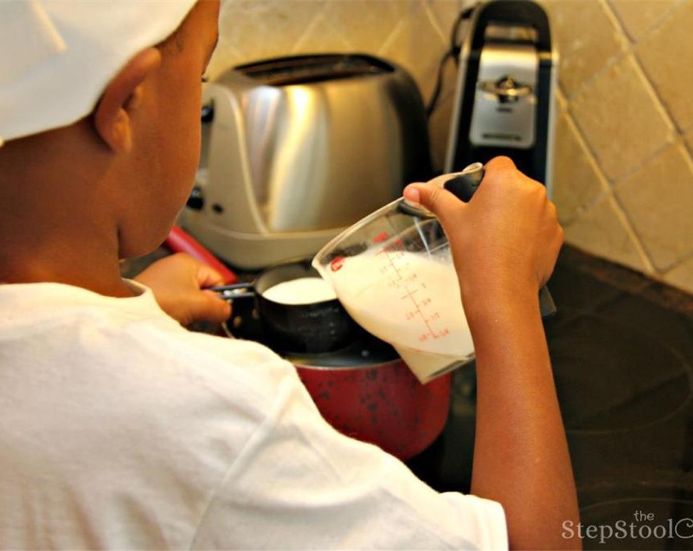 step 4 Bring one cup of the Milk (1 cup) to just steaming in a medium saucepan set over low-medium heat.