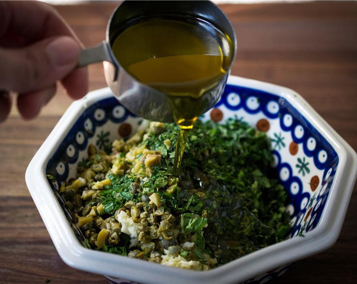 step 3 Add Extra-Virgin Olive Oil (1 cup), Red Wine Vinegar (2 Tbsp), Lemon (1), and Crushed Red Pepper Flakes (1/2 tsp) to the bowl.