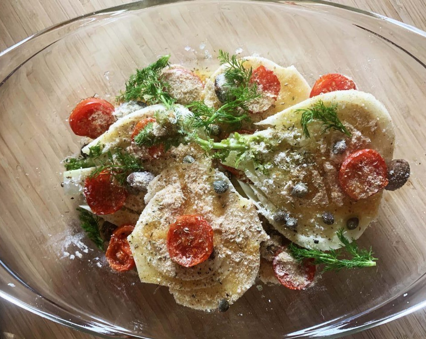 step 6 Add the tomatoes and sprinkle the top with the Grated Parmesan Cheese (1/2 cup) and Breadcrumbs (2 Tbsp). Drizzle the top with the remaining Extra-Virgin Olive Oil (1 tsp), and Dried Oregano (1 tsp).