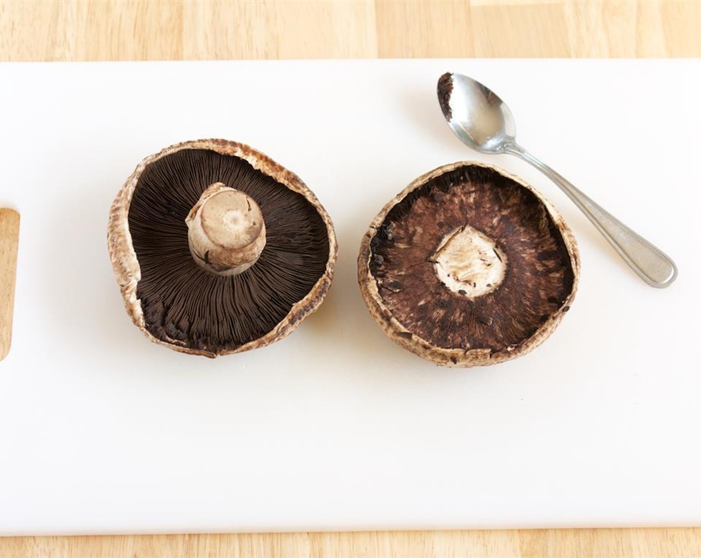 step 5 Remove the stems from the Portobello Mushrooms (4) and scrape out the gills with a spoon.
