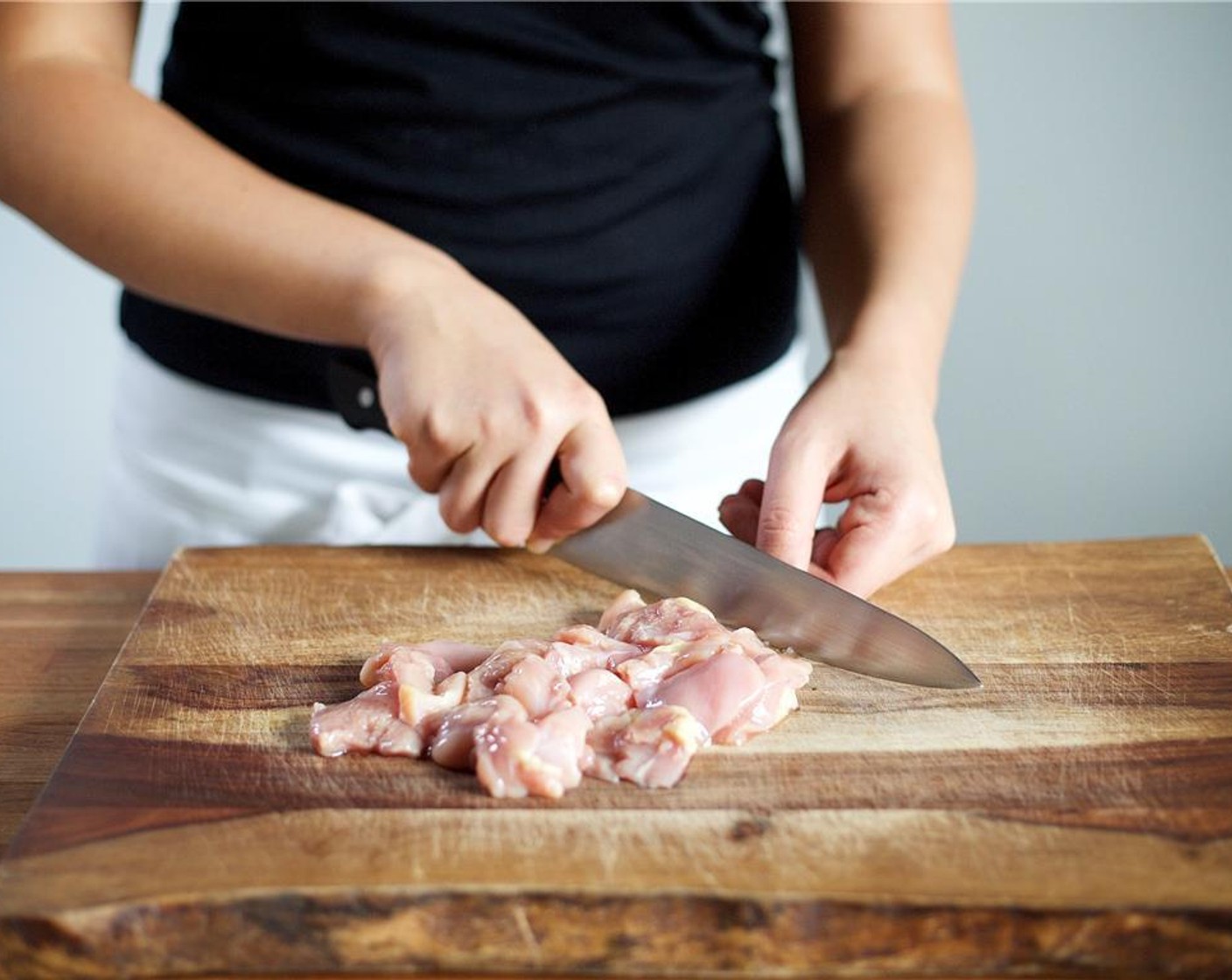 step 4 Pat dry the Boneless, Skinless Chicken Thighs (4) with a paper towel. Cut into one inch cubes, and set aside.