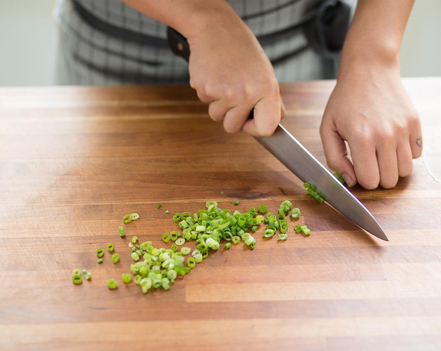 step 4 Cut the Scallion (1 bunch) into 1/4 inch thin pieces.