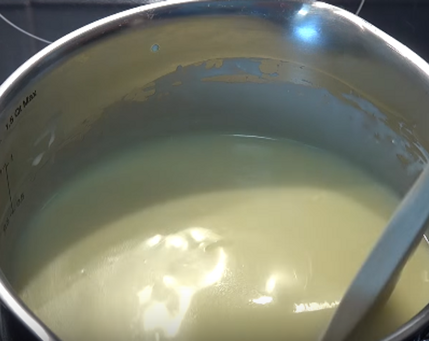 step 1 In a saucepan, add Whipping Cream (1/2 cup) and White Chocolate (2/3 cup). Gently stir over a low heat until completely mixed together. Set aside for 5 minutes to cool.