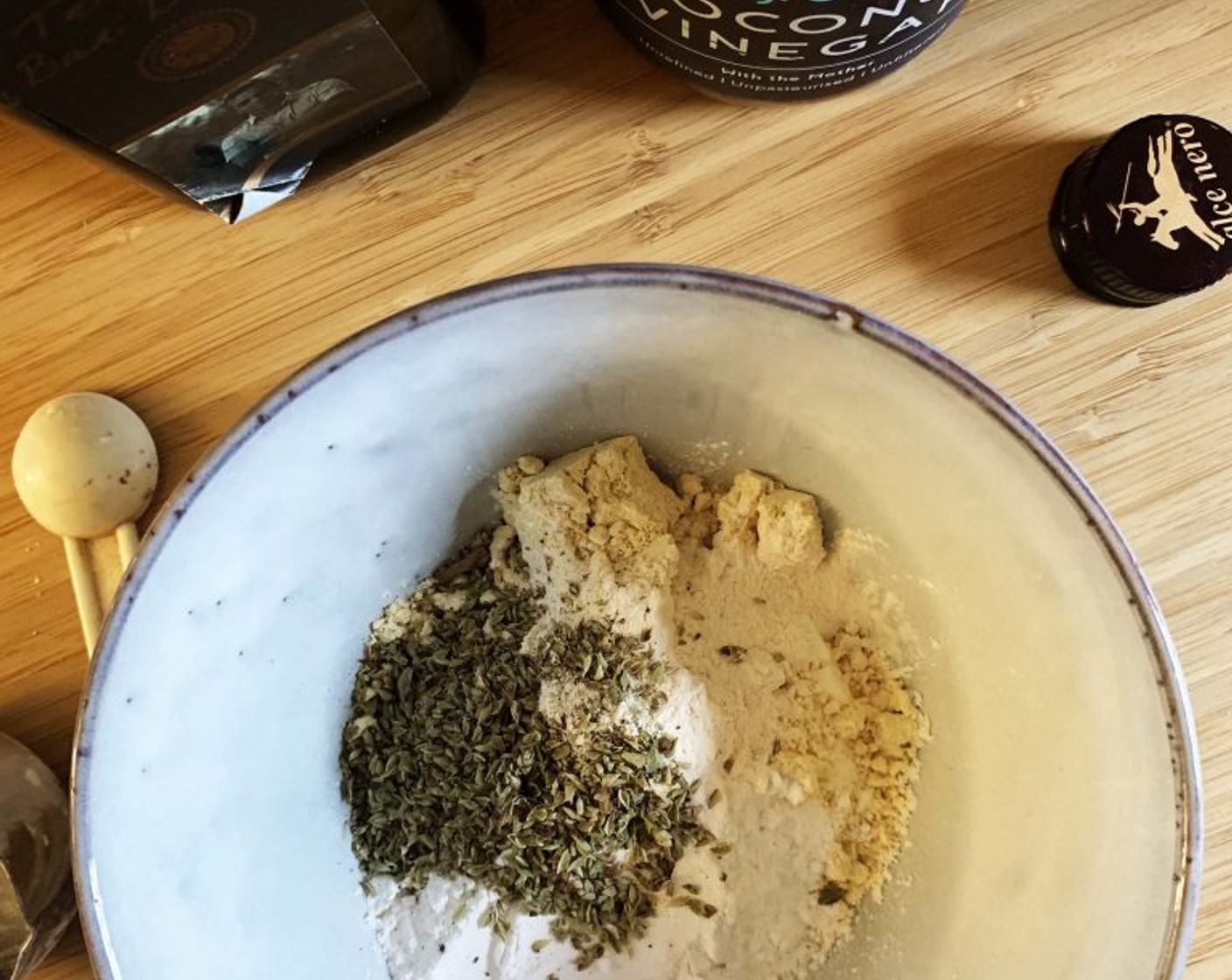 step 2 In a bowl combine the Unflavored Whey Protein Powder (3 1/2 Tbsp), Soy Flour (4 Tbsp), Rice Flour (1 1/2 Tbsp), Dried Oregano (1 tsp), and Xanthan Gum (1/2 tsp).