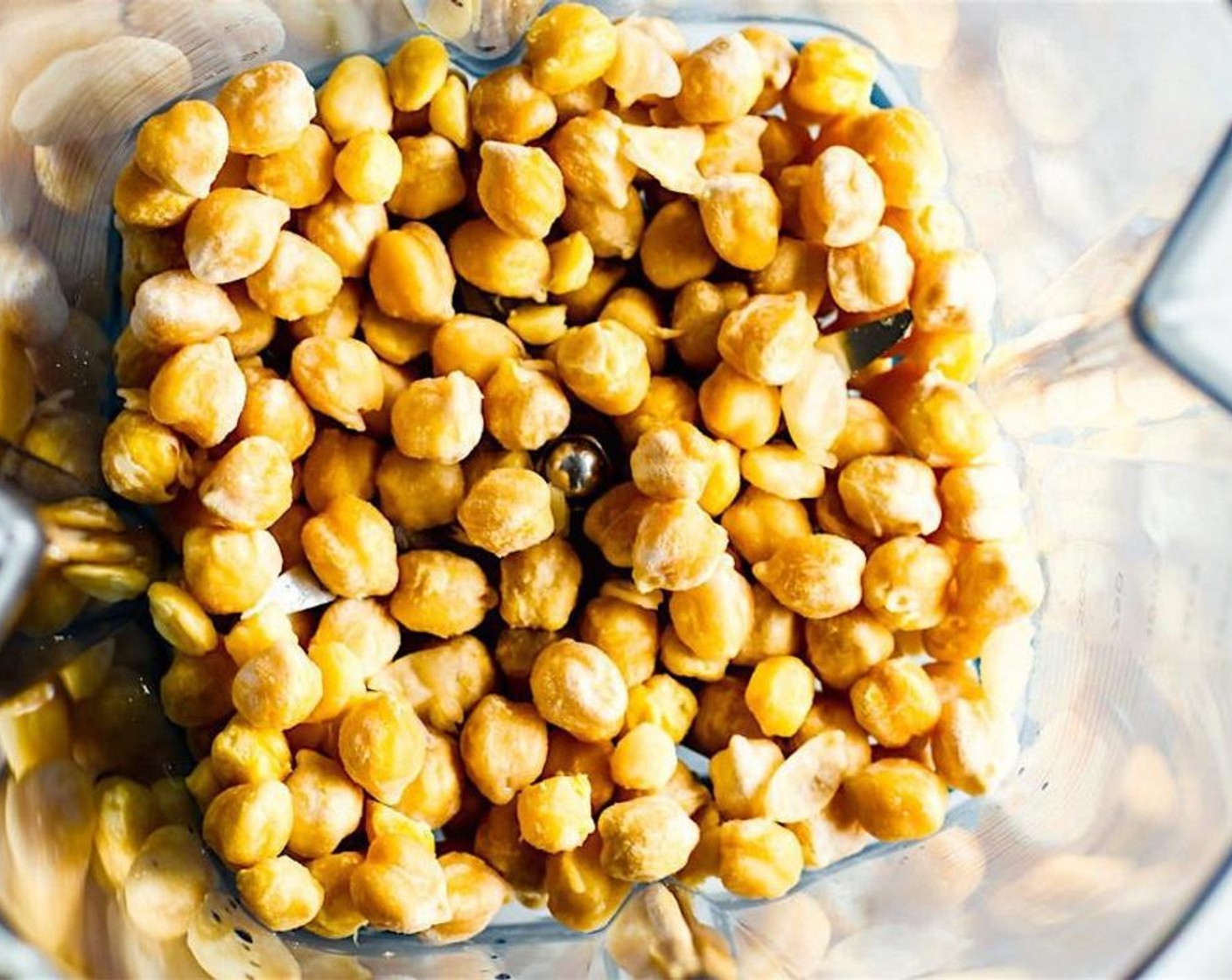 step 1 Drain the liquid from Canned Chickpeas (1 can) into a medium-sized mixing bowl.