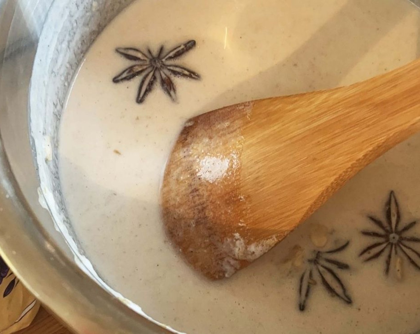 step 4 In a saucepan, bring Coconut Milk (7 oz), Soy Milk (3.5 oz), Water (3.5 oz), Star Anise (1), Vanilla Extract (1/2 tsp), and Ground Cinnamon (1/2 tsp) to a boil