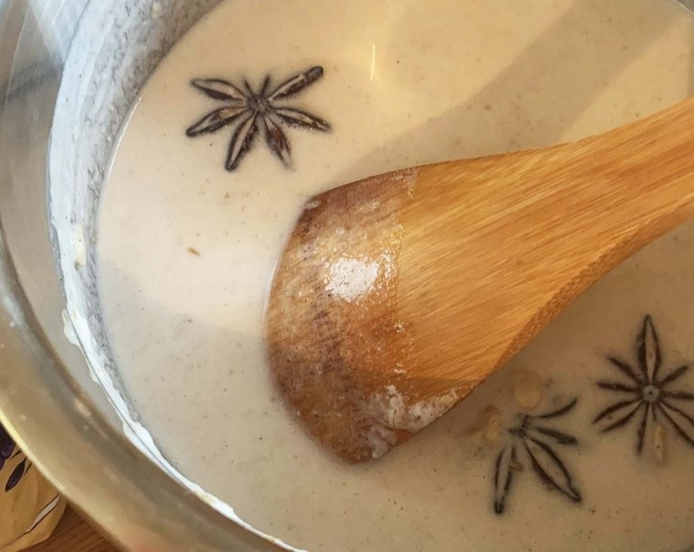 step 4 In a saucepan, bring Coconut Milk (7 oz), Soy Milk (3.5 oz), Water (3.5 oz), Star Anise (1), Vanilla Extract (1/2 tsp), and Simply Organic Cinnamon, Ground (1/2 tsp) to a boil