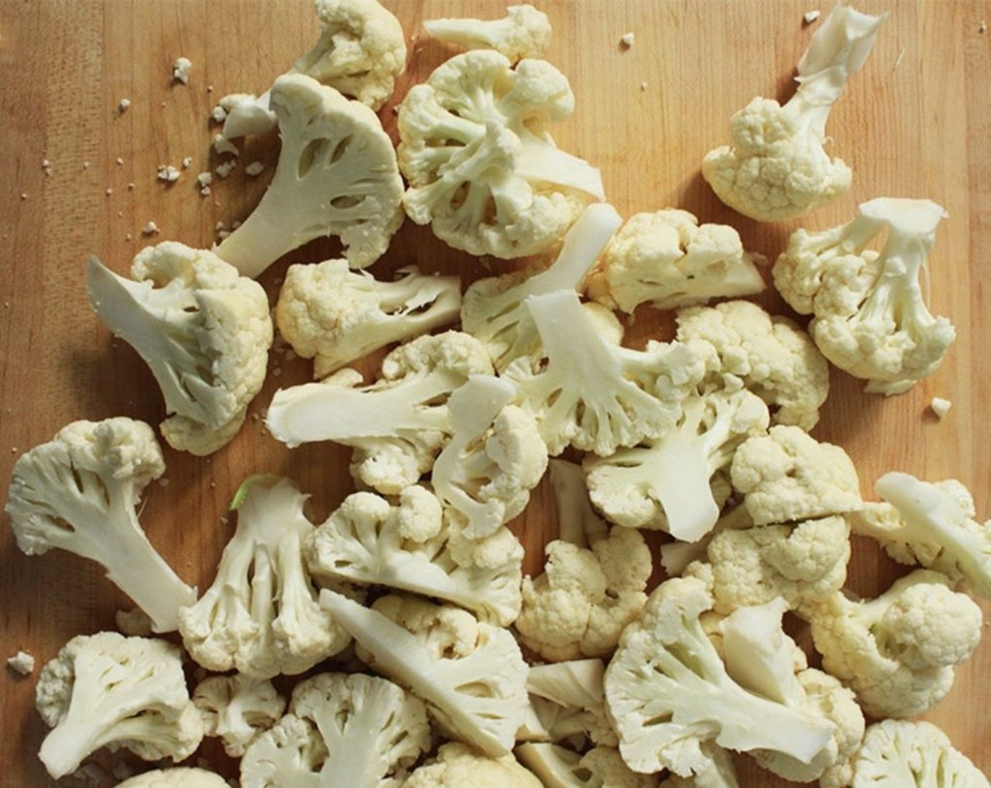 step 2 Trim the leaves from the Cauliflower (1 head), remove the core, and cut the cauliflower into medium-size florets.