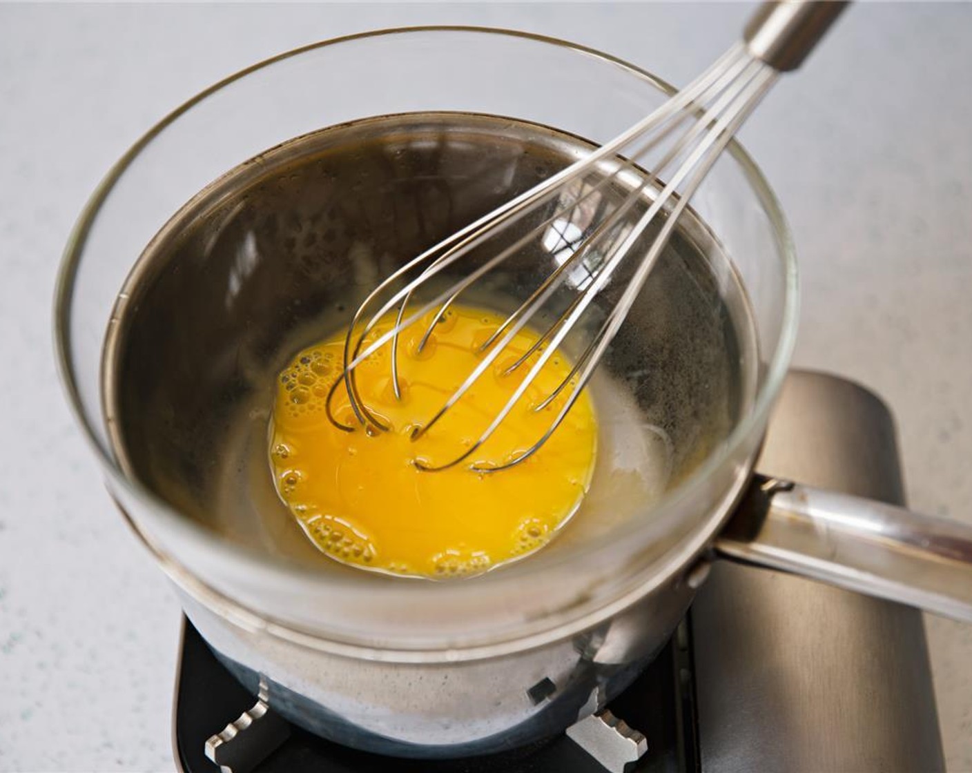 step 6 Whisk yolks together.