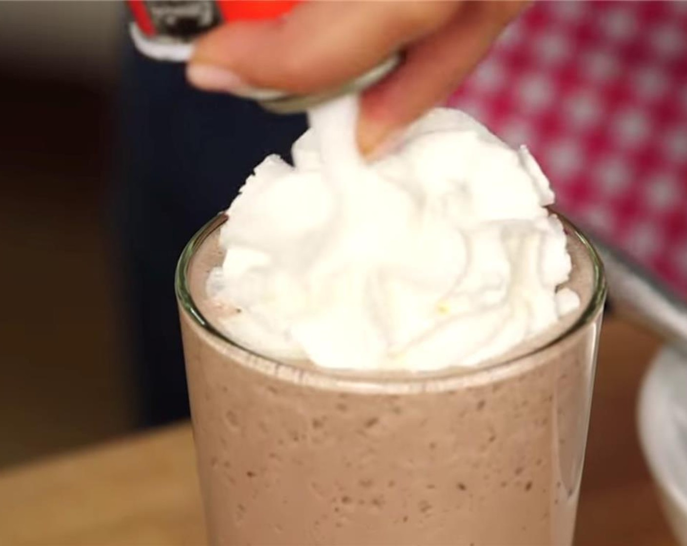 step 3 Pour into a 16-ounce pint glass, and garnish with Whipped Cream (to taste) and additional mini chocolate chips.