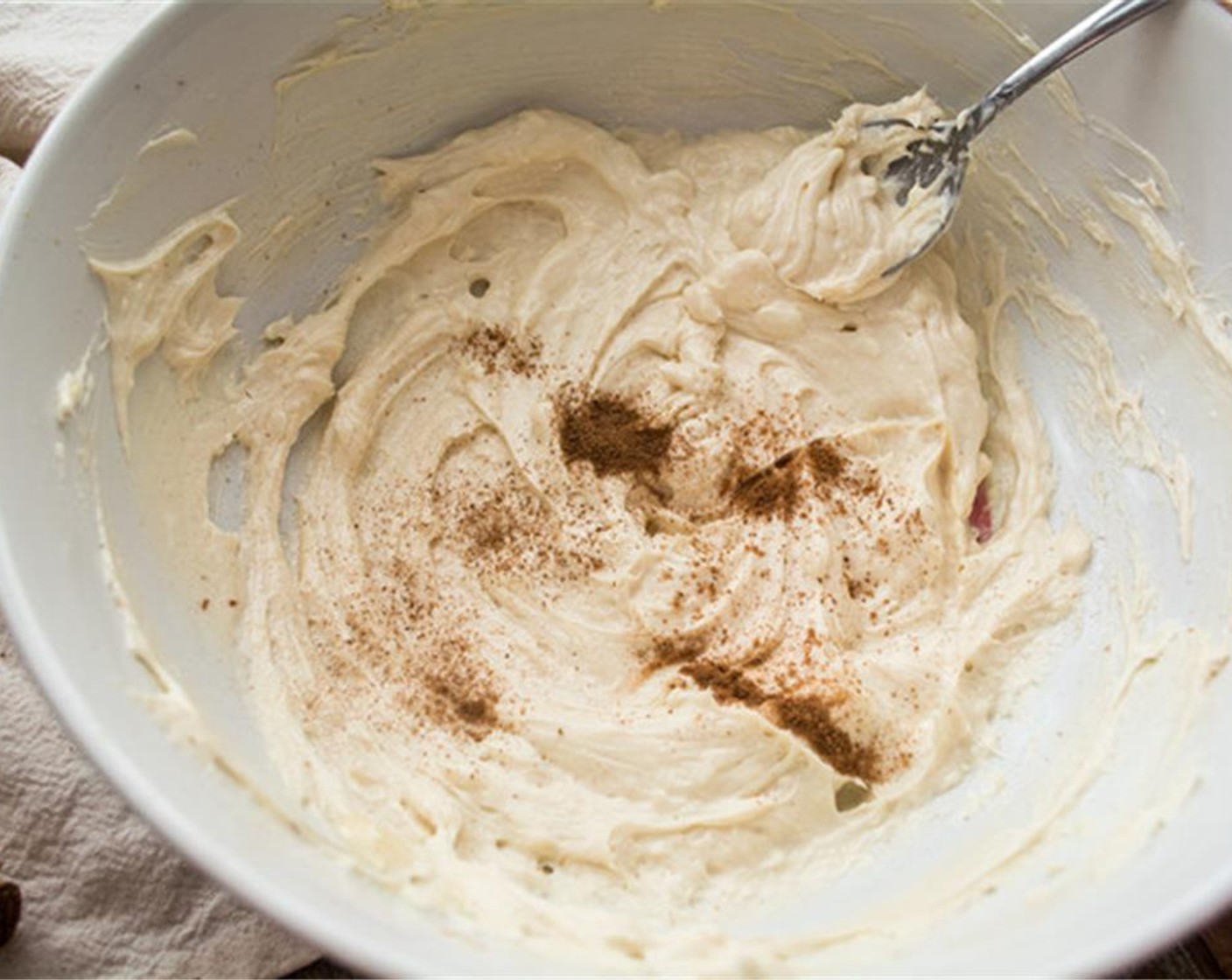 step 6 Remove cookies from pan to a wire rack and allow to cool completely. To make cream cheese filling, beat softened Unsalted Butter (1/3 cup), Cream Cheese (3/4 cup), Honey (1/4 cup), Vanilla Extract (1 tsp) and Ground Cinnamon (1/8 tsp) in a bowl.