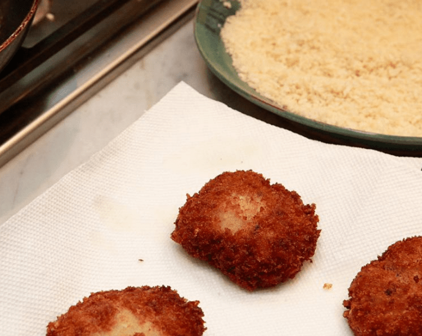 step 12 Remove from oil and drain the croquettes on paper towels.