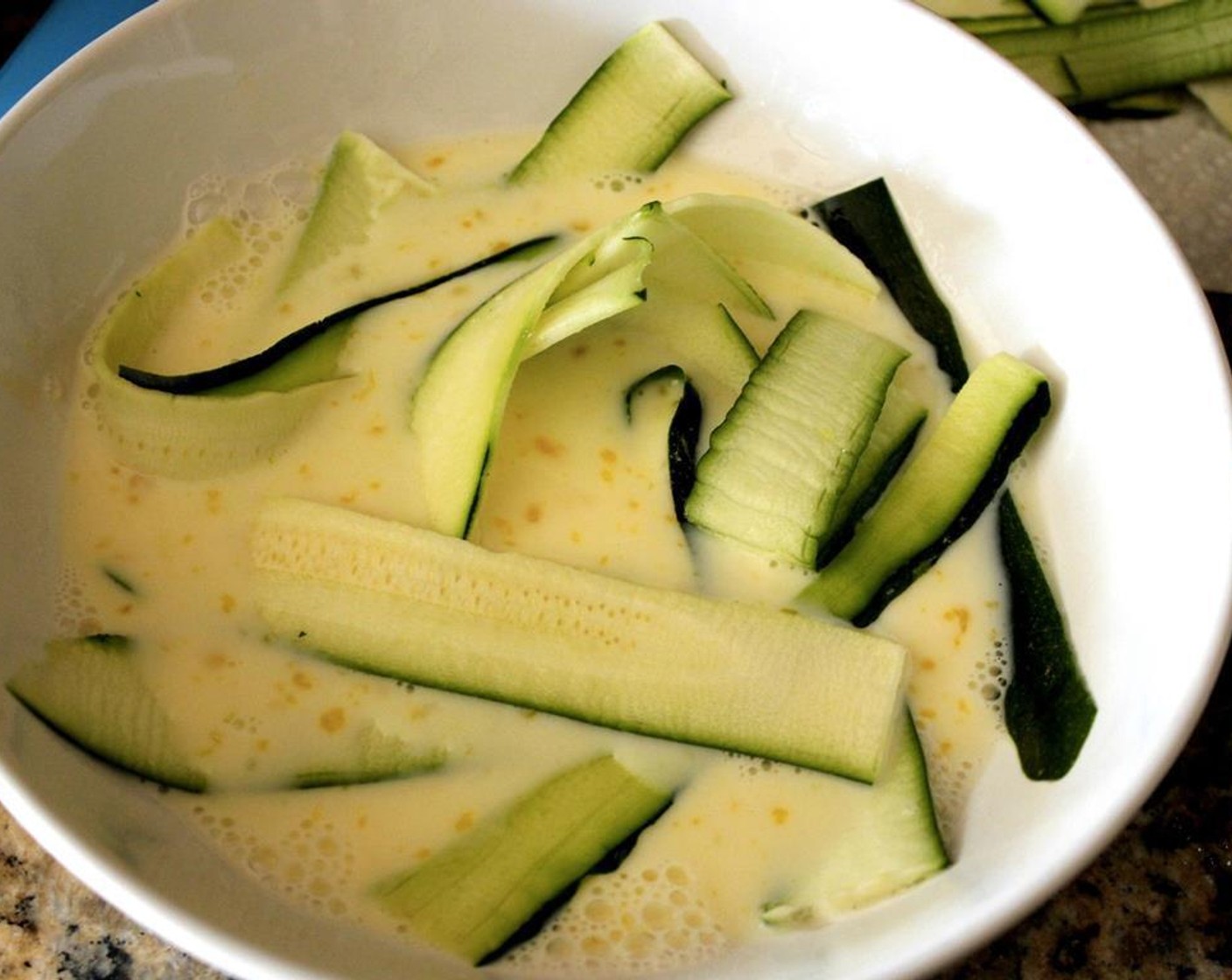 step 3 Soak the zucchini in the mixture.