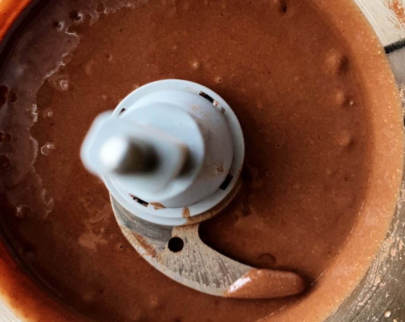 step 10 Place Hazelnuts (2 cups), Chocolate Whey Protein Powder (2 scoops), and Dark Cocoa Powder (2 Tbsp) into a food processor and blend until creamy, stopping and scraping the sides a few times. This will take some time, depending on how powerful your processor is. Transfer the cream into clean jars and refrigerate to allow to settle.