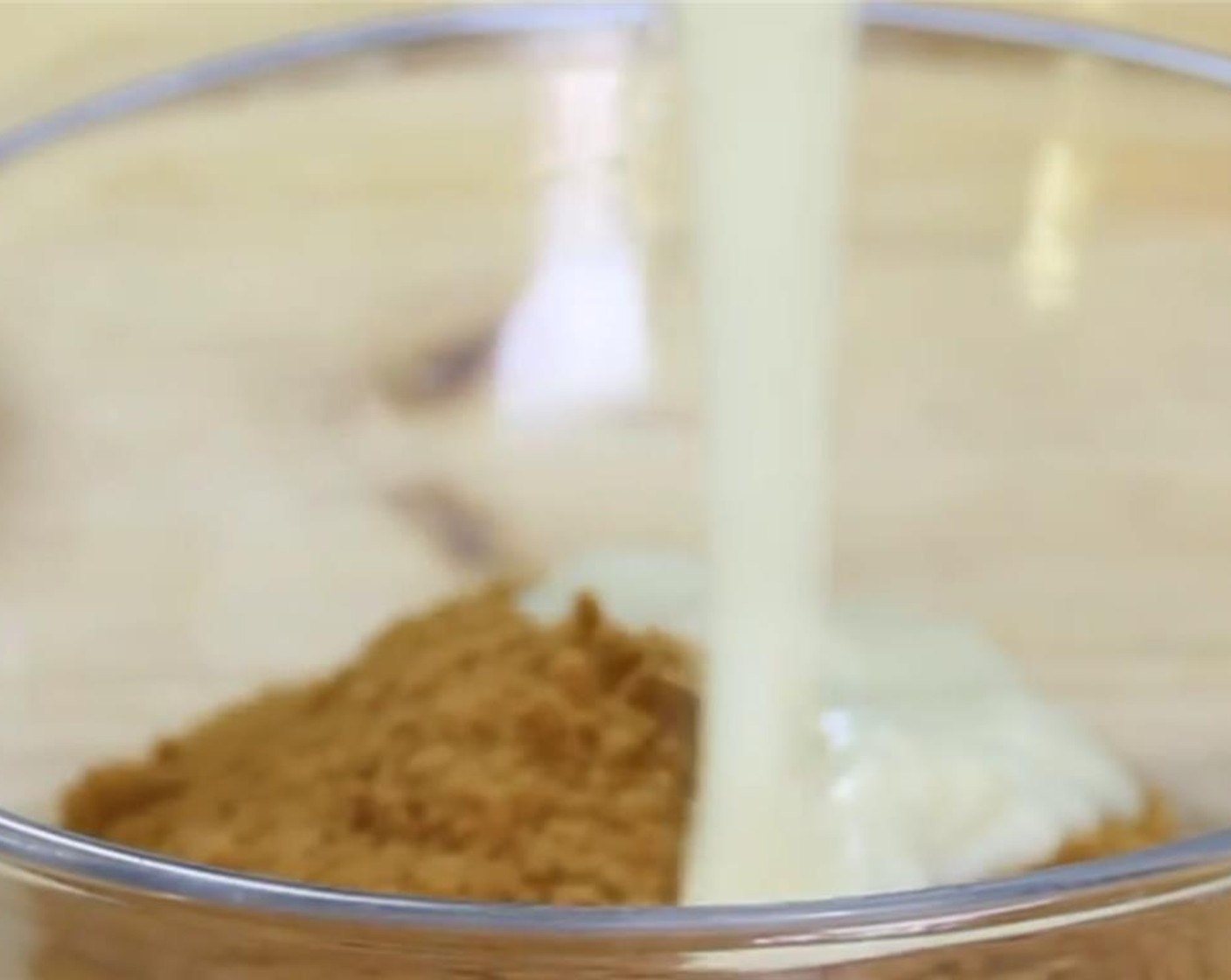 step 1 Add La Lechera® Sweetened Condensed Milk (1/3 cup) and Graham Crackers (1 cup) in a bowl.