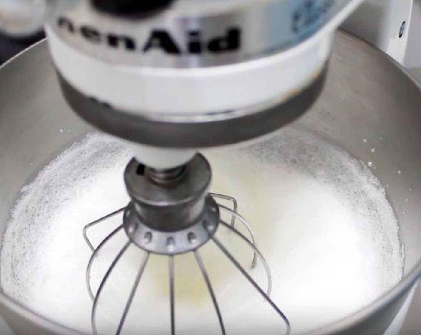 step 3 Into the bowl of a stand mixer, add the Eggland's Best Classic Eggs (6) whites along with the Vanilla Extract (2 tsp) and Salt (1 pinch). Whisk at medium speed until mixture forms soft peaks.