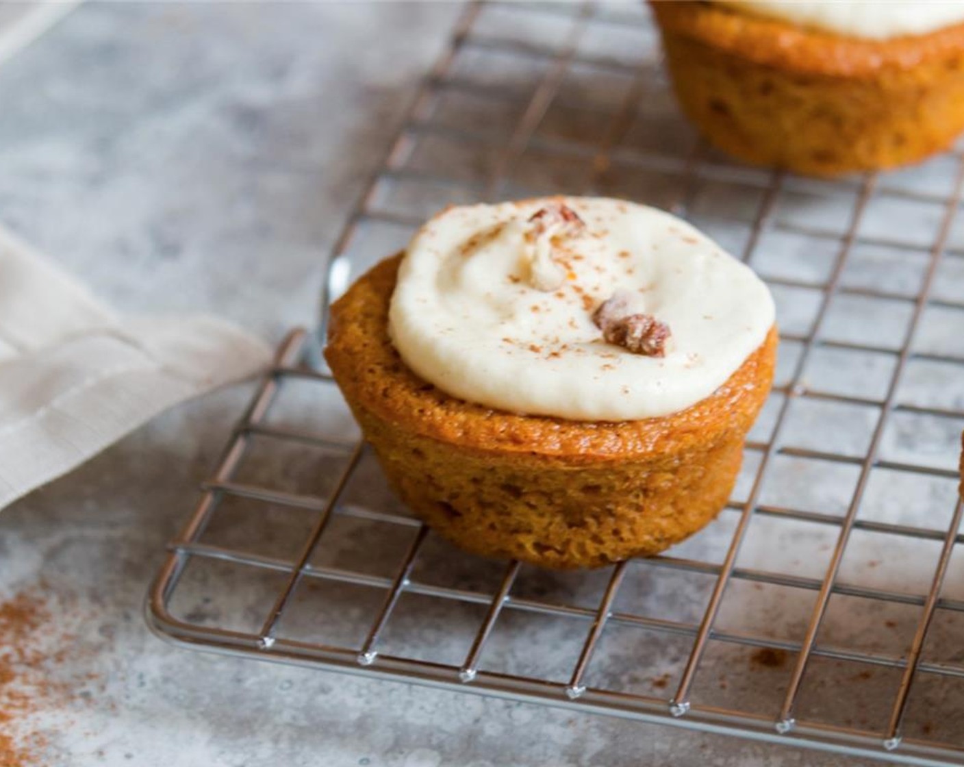 step 8 Top the cupcakes with frosting as desired. Decorate with chopped Candied Pecans (to taste), and a light pinch of Simply Organic Cinnamon, Ground (to taste) or pumpkin spice.