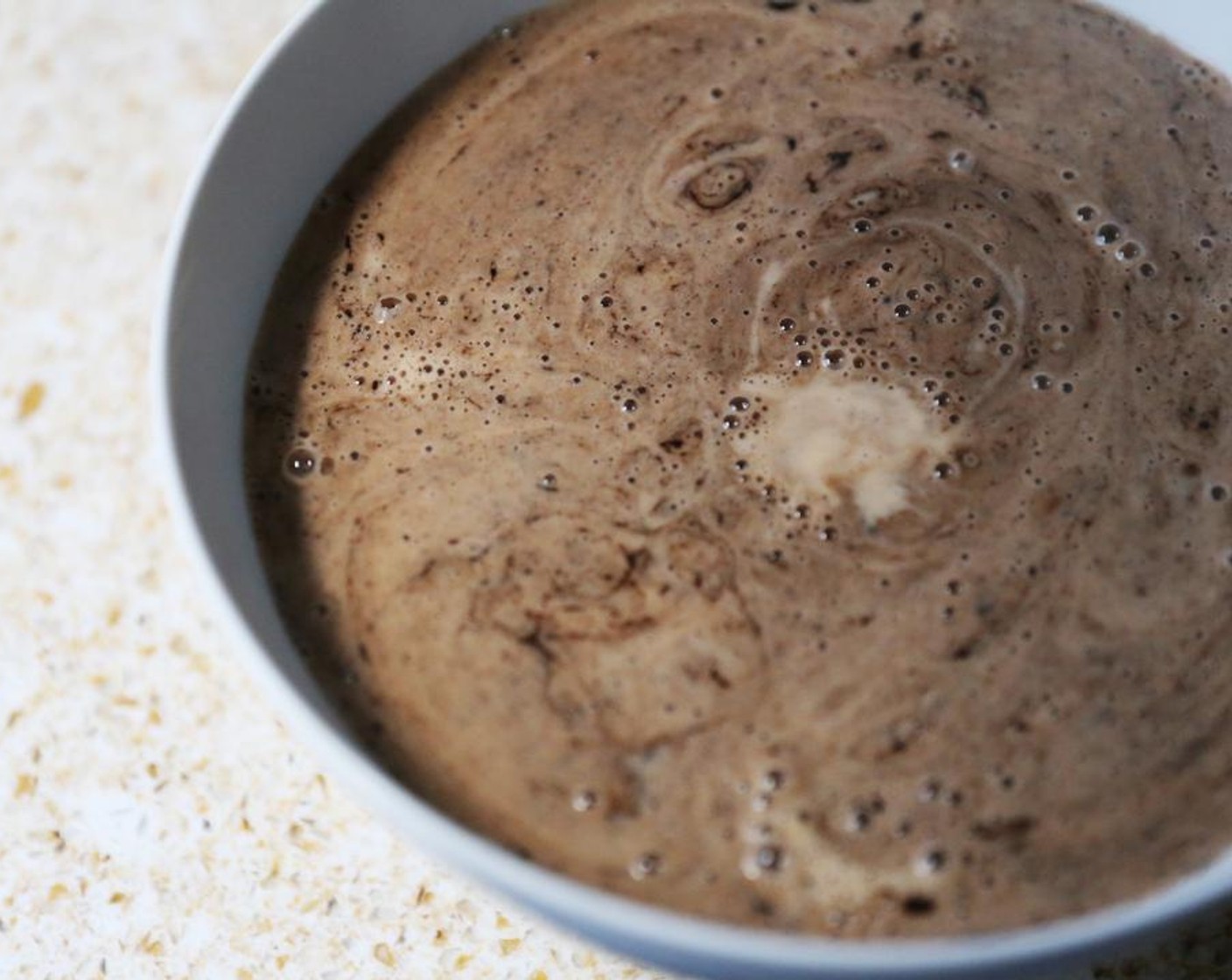 step 4 Pour the hot coconut milk mixture over the chocolate.