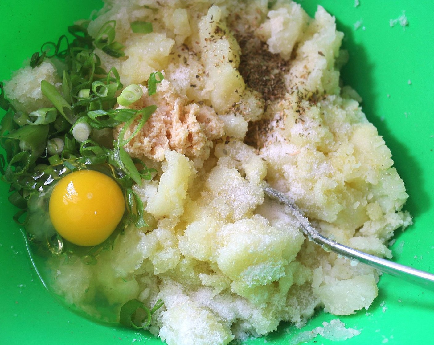 step 8 Add Eggland's Best Classic Egg (1), Scallions (4), Horseradish (1 Tbsp), Extra-Virgin Olive Oil (2 Tbsp), Dried Marjoram (1/2 tsp), and Kosher Salt (to taste).