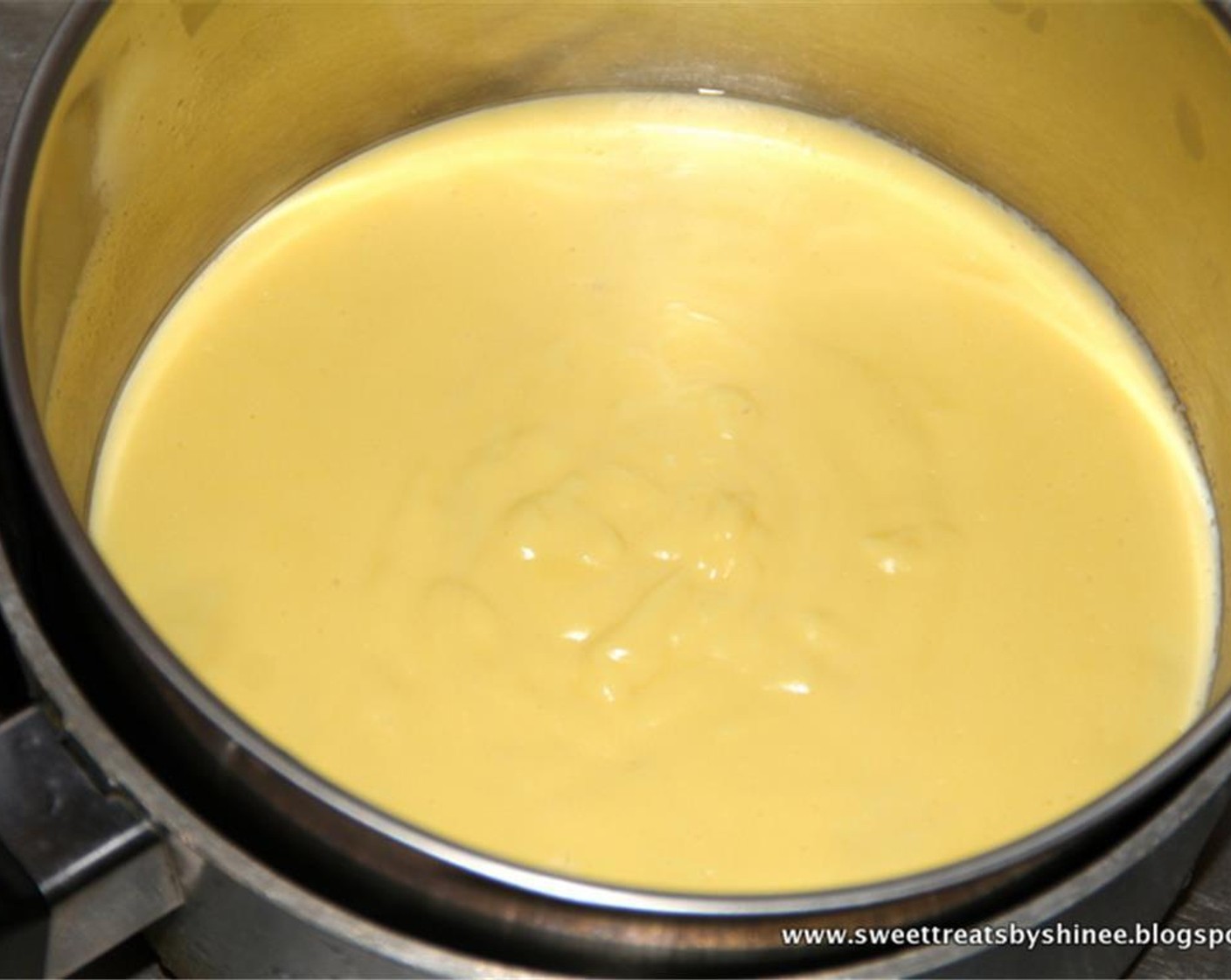 step 4 To temper the egg yolk mixture, add about 1/2 cup of the milk and mix quickly. Add the egg mixture to the milk. Cook over medium heat stirring frequently until it thickens.