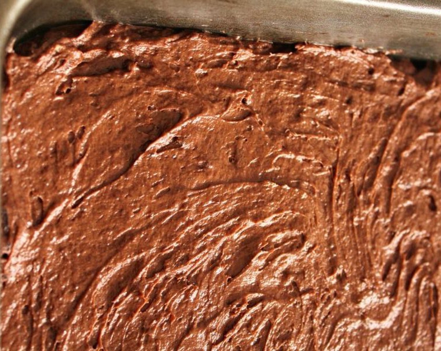 step 8 Pour the batter into the square pan and spread until even. Bake for 25 minutes. They’re done when you press down lightly on the top of the brownies and they bounce back. They should be firm on the outside and soft and fudgy in the center.