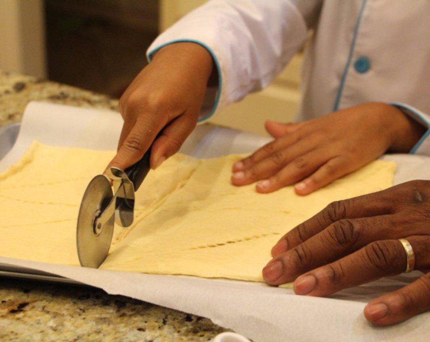 step 5 Unroll the Crescent Roll Dough (8 oz) and separate into 8 triangles on a baking sheet lined with parchment paper.