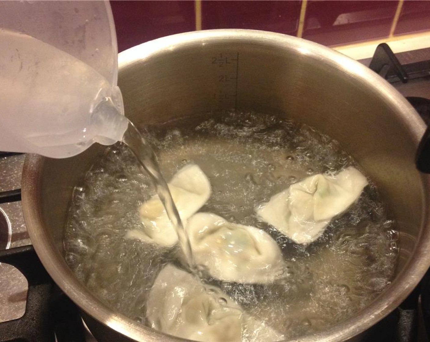 step 7 Place wontons in one at a time stirring so they do not stick to each other. Add bok choy leaves. Reduce heat to medium and cook for 15 minutes.