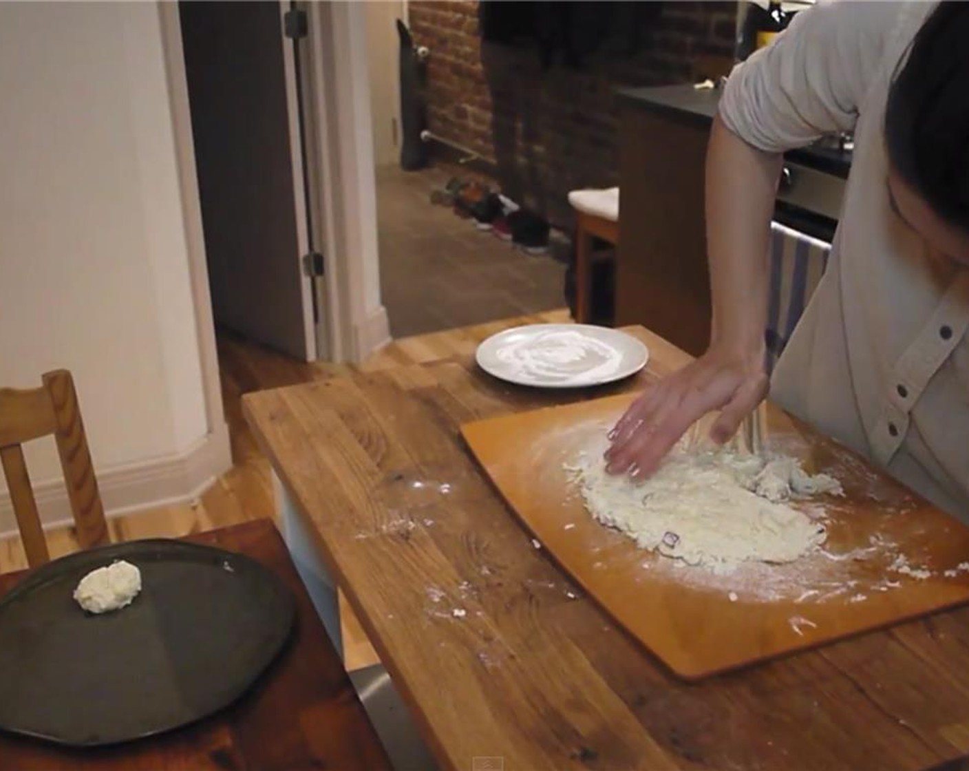 step 8 Greese a pan with the leftover bacon fat. Transfer dough to a lightly floured board. Pat the dough down until its 1/4-inch think. Cut the dough with the rim of a drinking glass that lightly dusted with flour.