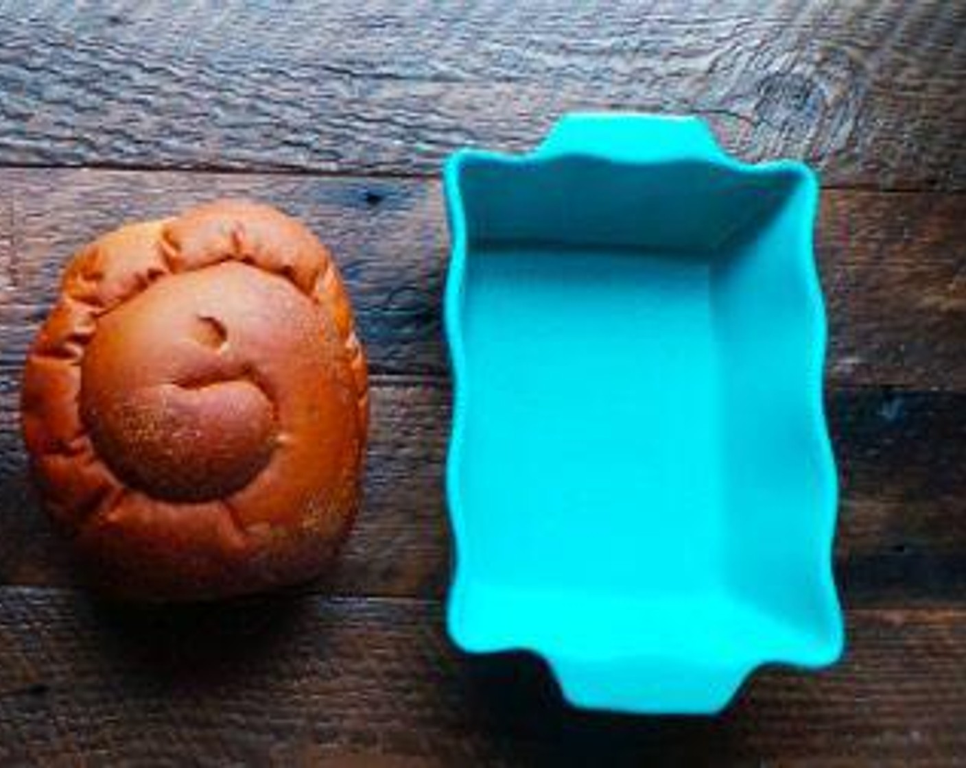 step 2 Spray a baking pan with baking spray and add the Challah Bread (1).