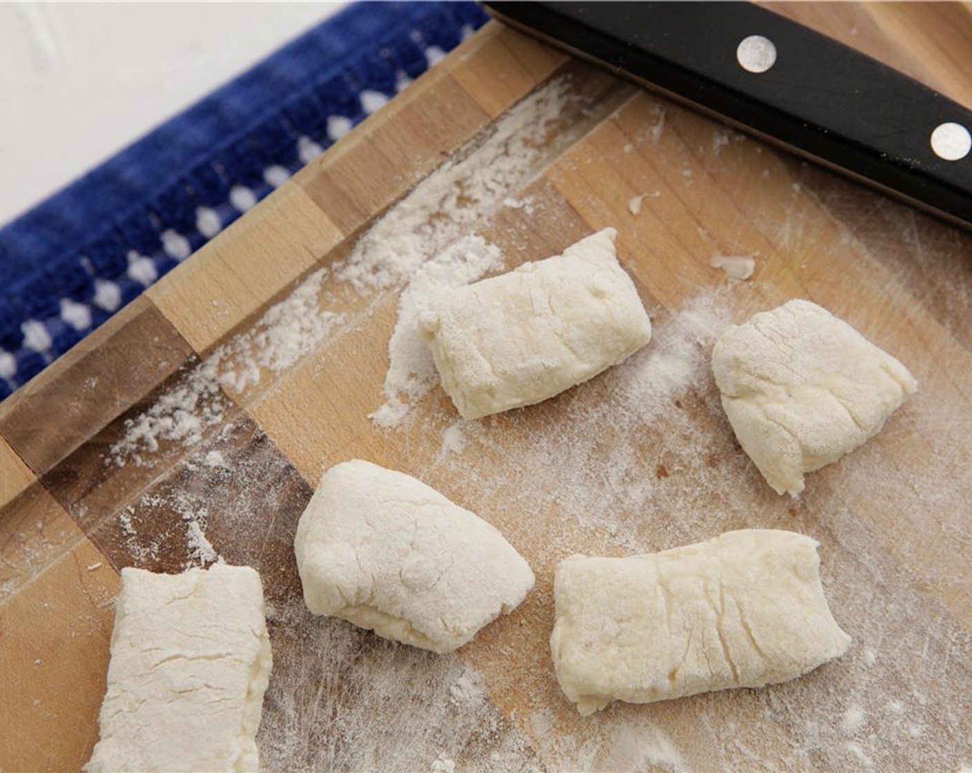 step 8 Coat cut pieces in extra flour and toss gently to seperate.