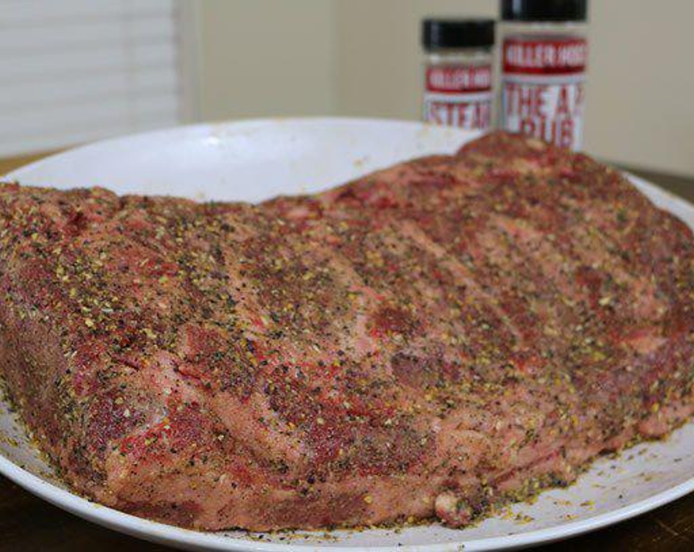 step 2 To add extra flavor and texture on the outside, layer with Steak Spice Rub (to taste). Let the Smoked New York Strip Loin rest for at least 1 hour after seasoning. This gives the salt and spices ample time to work into the meat.