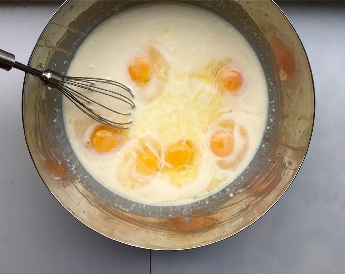 step 4 Stir well. Add the Eggland's Best Classic Eggs (4) and a pinch of Salt (to taste).