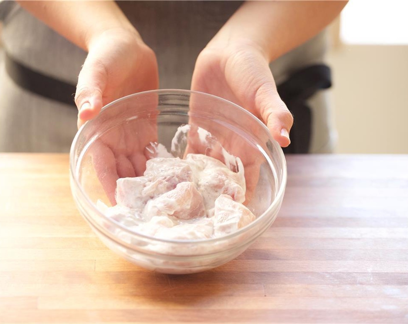 step 4 Pat dry Chicken Breasts (2) with paper towels. Cut chicken into 1" diced pieces. Place in the bowl with the yogurt mixture. Mix to combine and let marinade in the refrigerator.