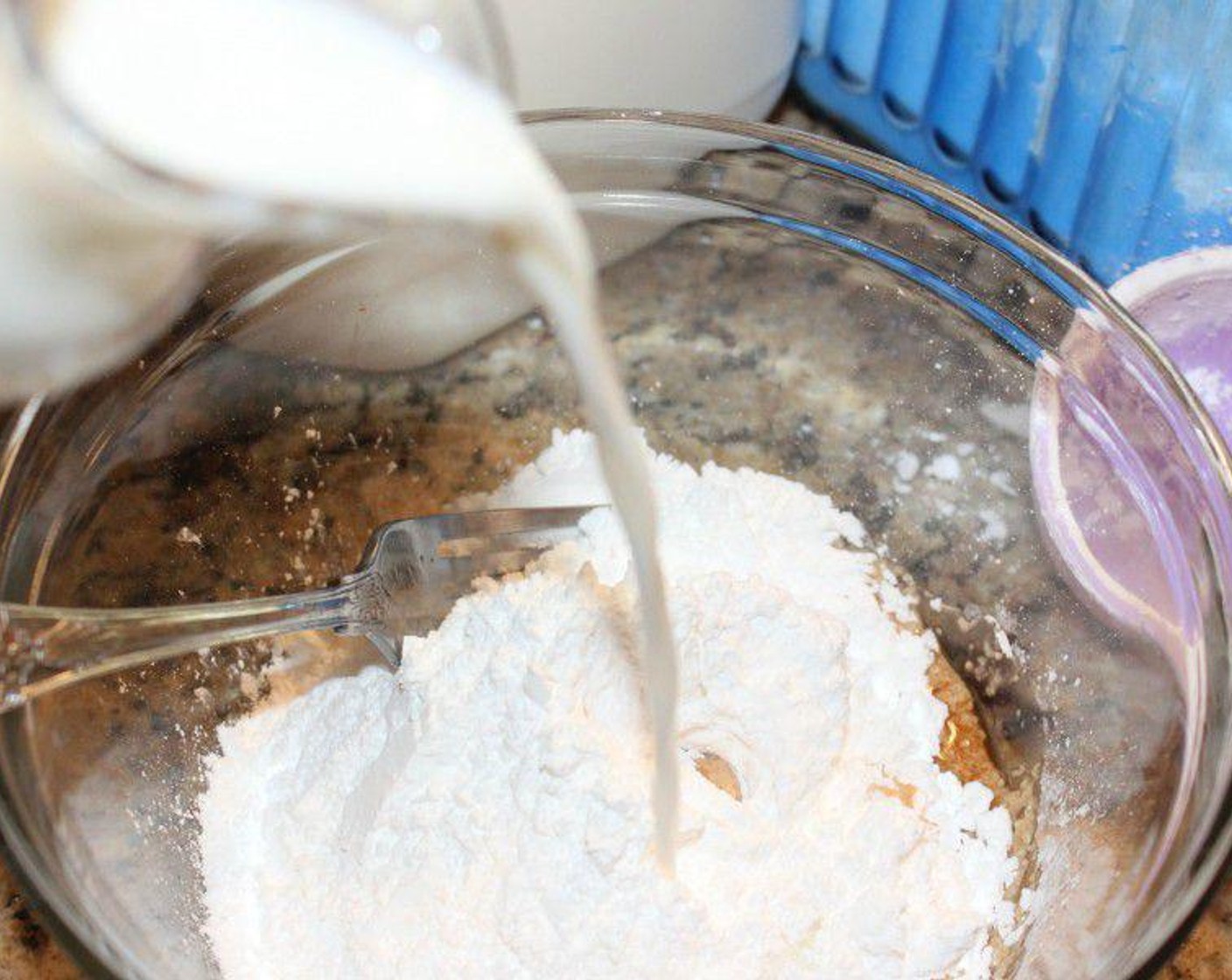 step 5 While they’re cooling, make the glaze by mixing up the Powdered Confectioners Sugar (1 cup), Milk (2 Tbsp) and Vanilla Extract (1 tsp) until smooth.