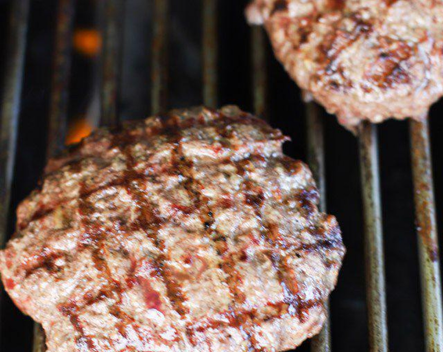 step 5 Divide 85/15 Lean Ground Beef (2 lb) into 4 portions and form into patties with hands. Use wax paper as surface to form patties. Start grilling burgers to your perfection.