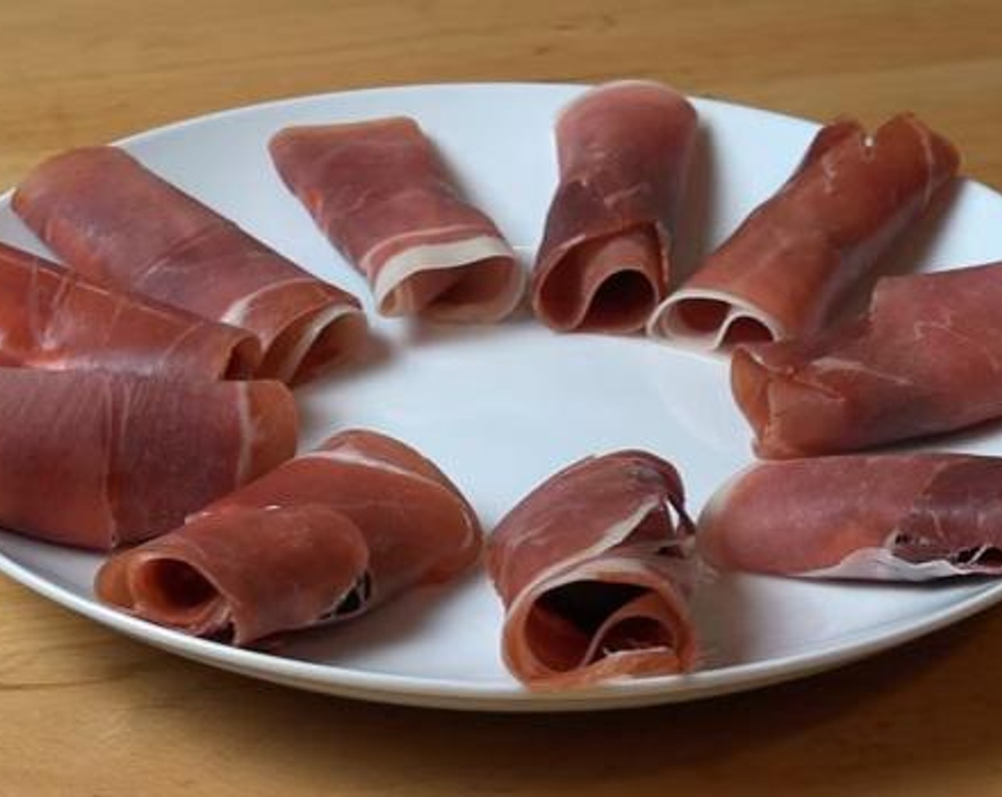 step 2 Roll each parma ham. Place on a plate and serve. Enjoy!