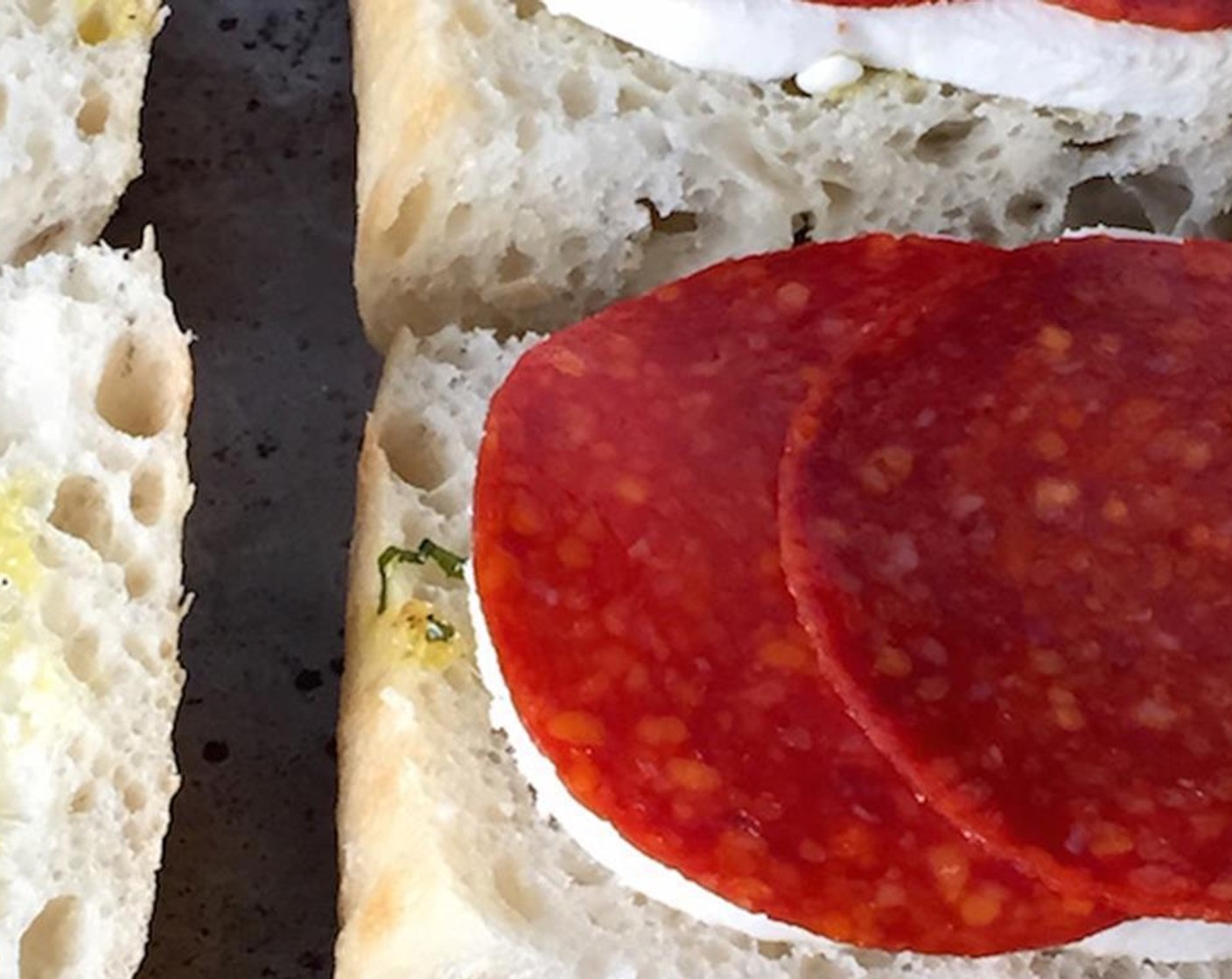 step 4 Distribute the sliced Fresh Mozzarella Cheese Ball (1 1/3 cups) and Pepperoni Slice (3/4 cup) evenly.