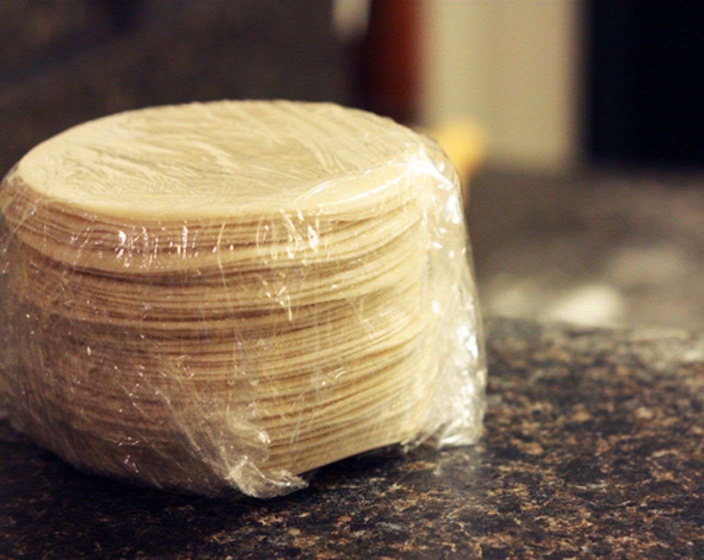 step 7 Wrap stack of wrappers tightly with plastic wrap and refrigerate until you are ready to add the filling.