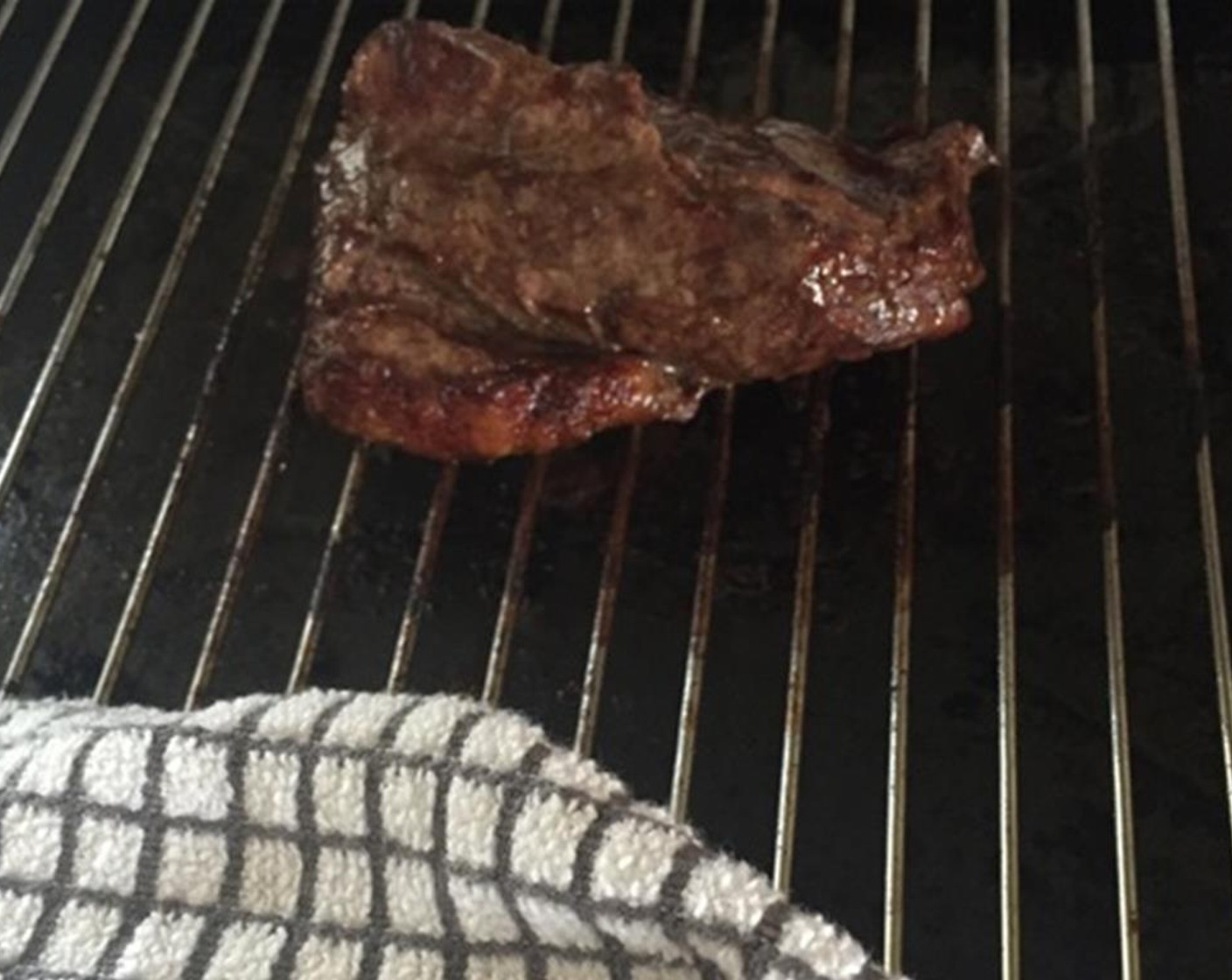 step 4 Cook the steak under the grill, much more slowly than if cooking a steak to eat whole in a pan or griddle.  I cooked mine 7 minutes each side.