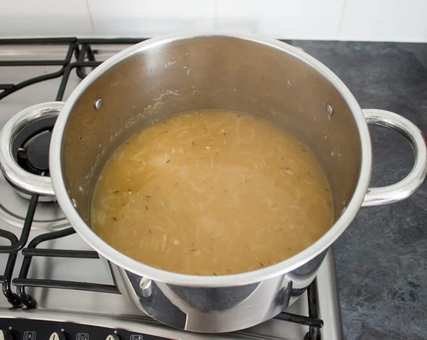 step 6 When the timer has beeped – remove the lid and fish out the bay leaves and thyme sprigs. If saving for later, allow to cool completely before dividing into bags/tubs and freezing. If you want to serve straight away – preheat your grill.