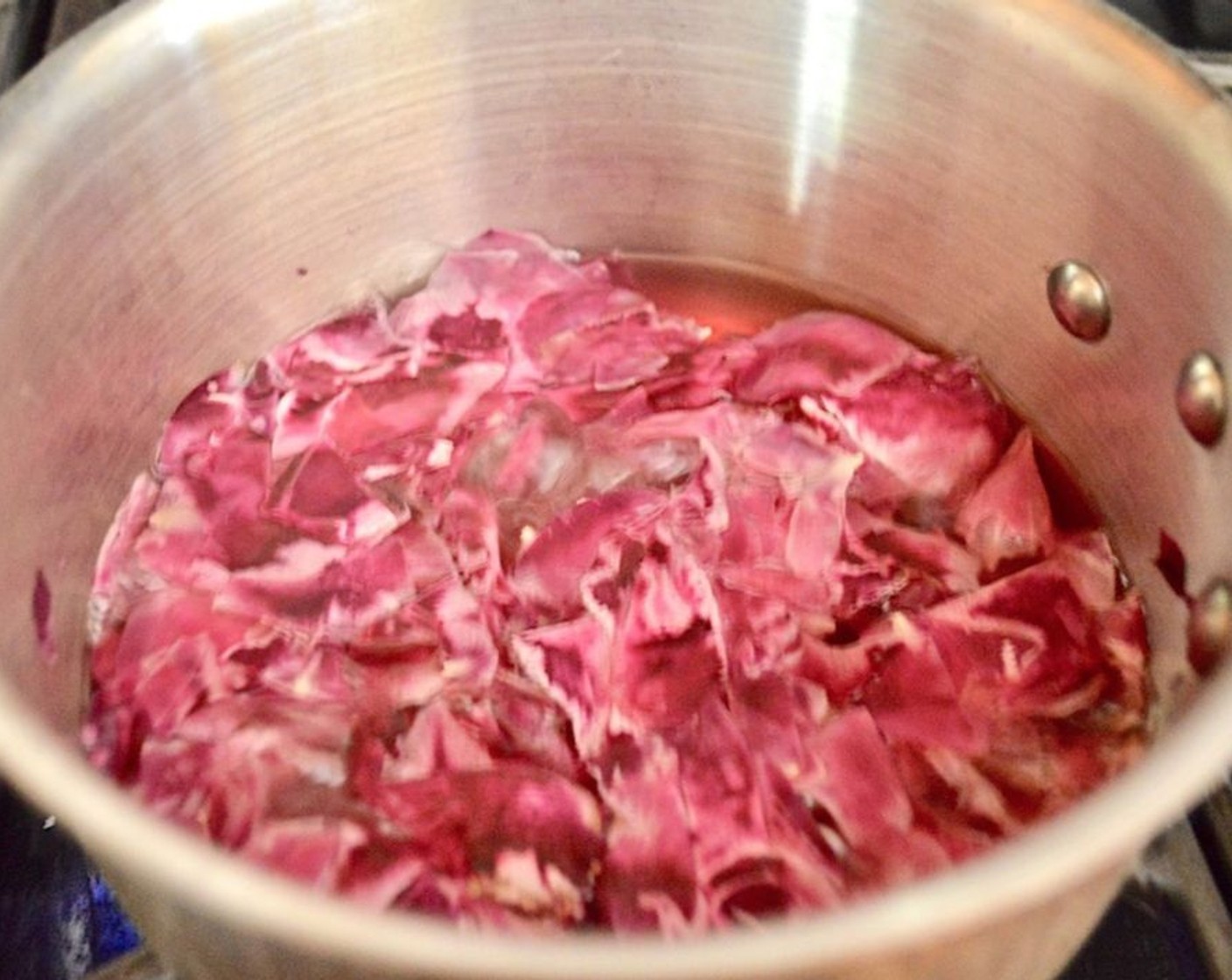 step 1 Combine the Fresh Rose Petals (2 cups) and Water (1 1/2 cups) in a medium saucepan and bring them to a gentle boil over medium heat. Let it gently simmer for 10 minutes.