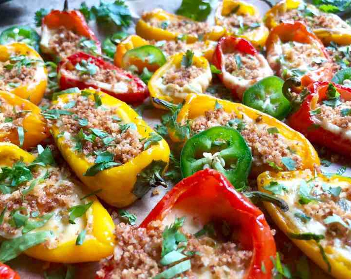 step 11 Sprinkle the filled mini peppers with the panko mixture and Fresh Cilantro Leaves (2 Tbsp).