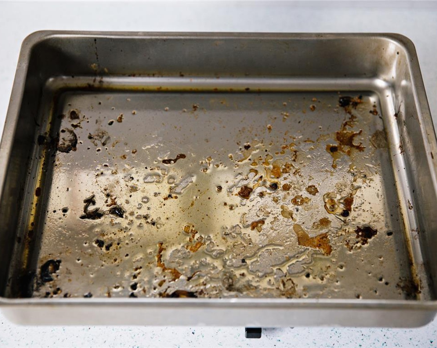 step 1 Place the roasting tray with remnants of roasted chicken juices on top of a burner, set to a low heat. The more leftover juices and crispy bits from roasting the chicken, the better!