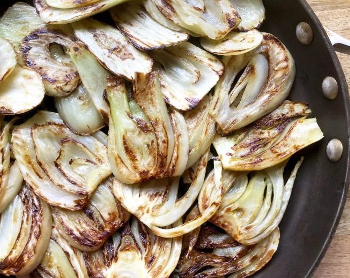 step 2 In a large skillet, set over medium heat, add Olive Oil (1 Tbsp). When hot, add the Fennel Bulbs (2) and sear on both sides, for 1-2 minutes per side. After you’re done with the fennel, transfer it to the bowl of your food processor.