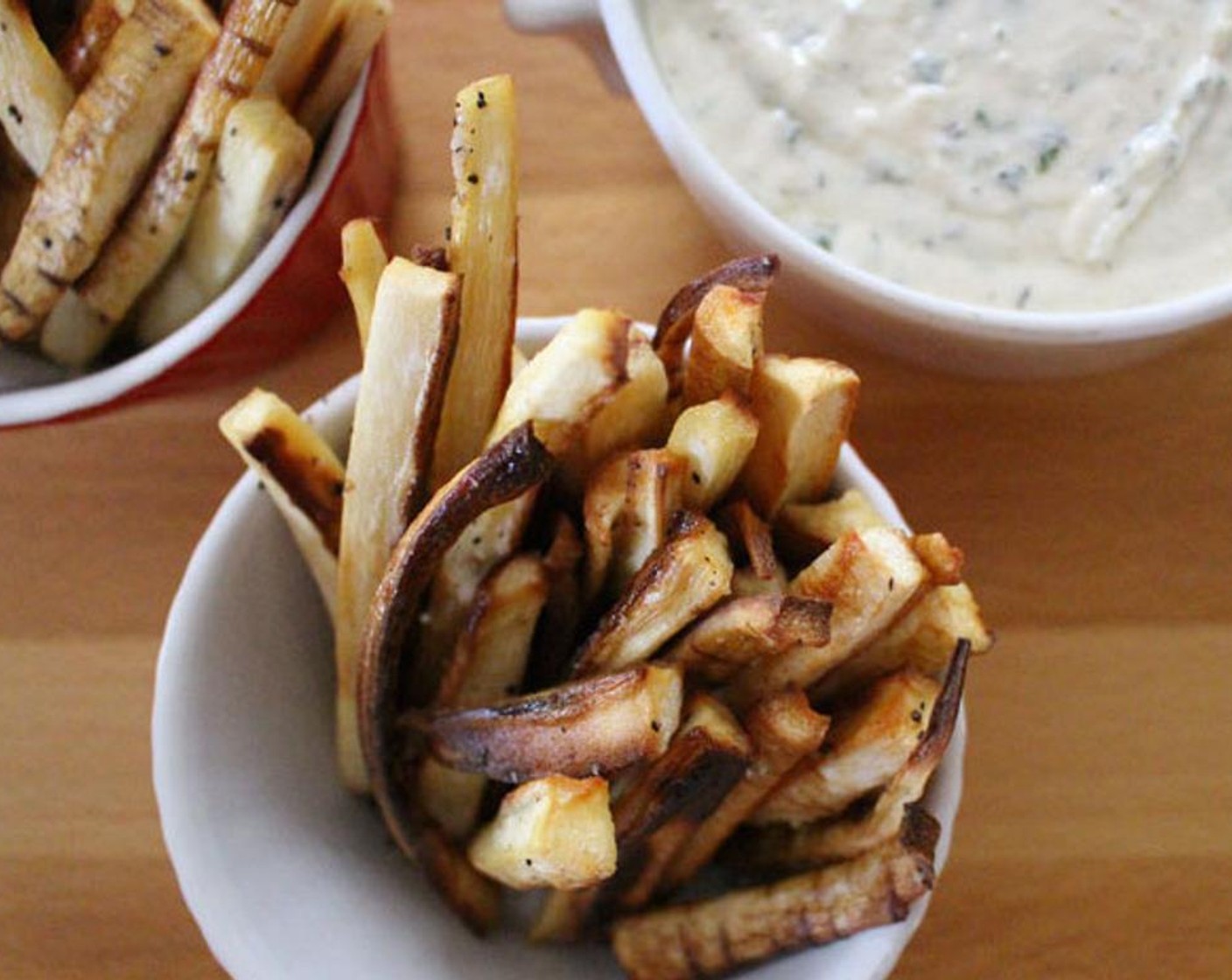 step 7 Serve parsnip fries with creamy garlicky herb dip on the side.